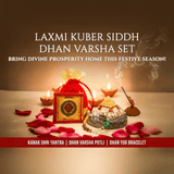 Set of Laxmi Kuber Siddh Dhan Varsha with candles.