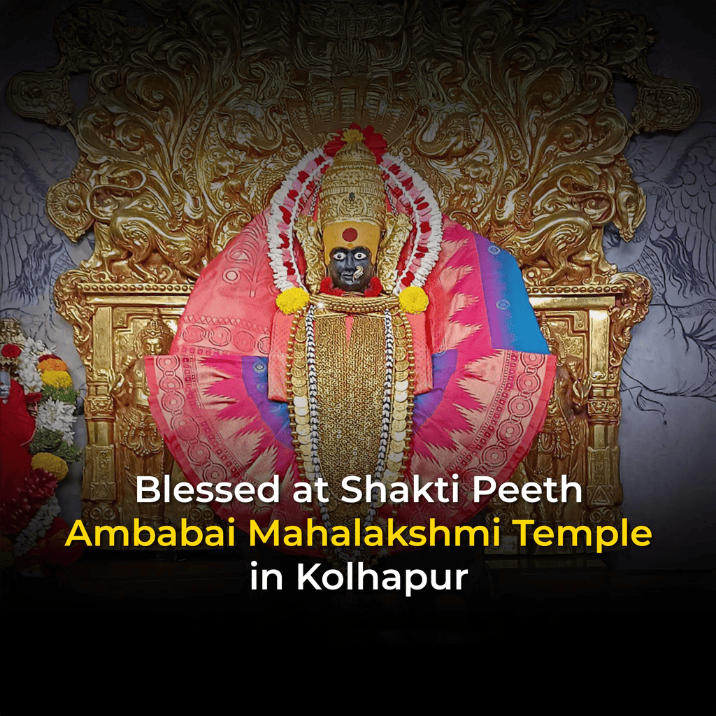 Statue of a deity in a temple setting with text about Shakti Peeth.