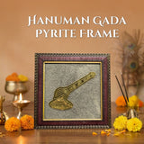 Framed Hanuman Gada Pyrite Frame on a wooden surface with decorative elements.