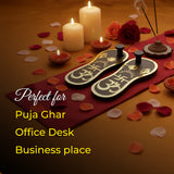 Decorative setting with candles, flowers, and incense sticks on a red cloth with text overlay.