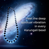 Necklace with beads against a cosmic background.