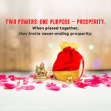 Red and gold pouch with a small statue on a white surface.