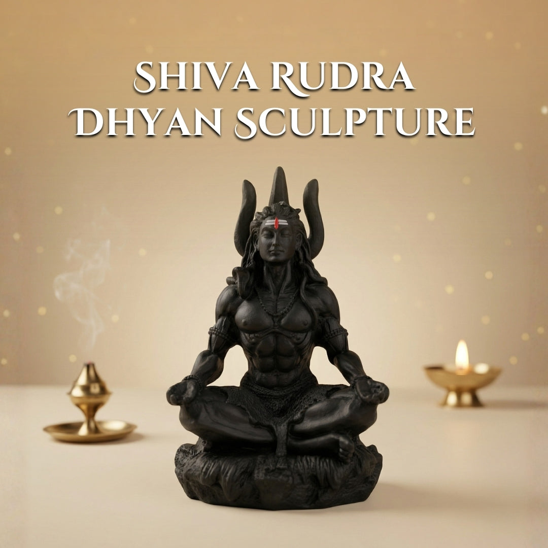 Shiva Rudra Dhyan sculpture with two lit lamps on a beige background