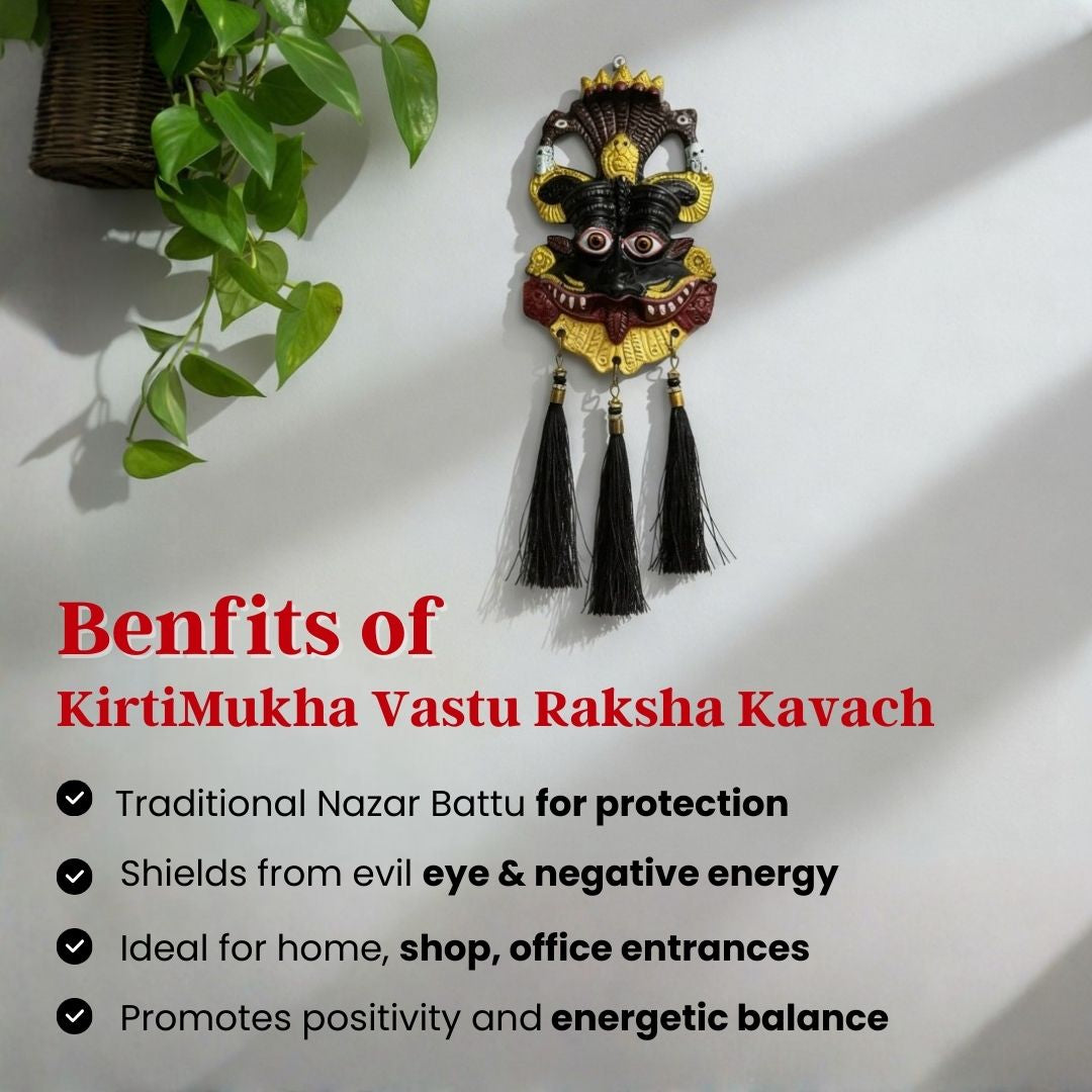 Kirtimukha Vastu Raksha Kavach with tassels on a white wall.