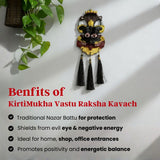 Kirtimukha Vastu Raksha Kavach with tassels on a white wall.