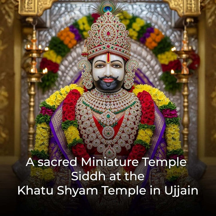 Miniature temple figure with intricate jewelry and floral decorations.